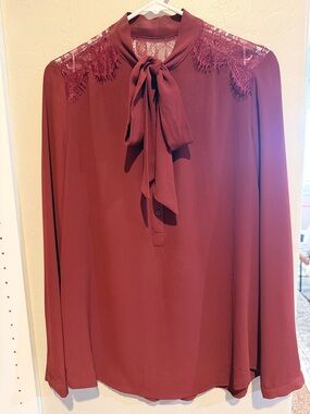 Burgundy button up blouse with tie